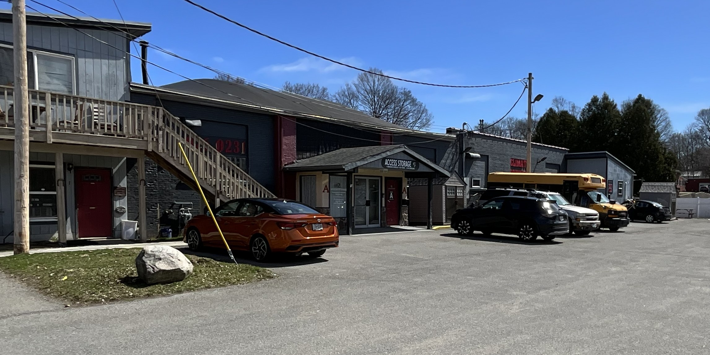 The Access Storage building, parking lot, and covered front entrance