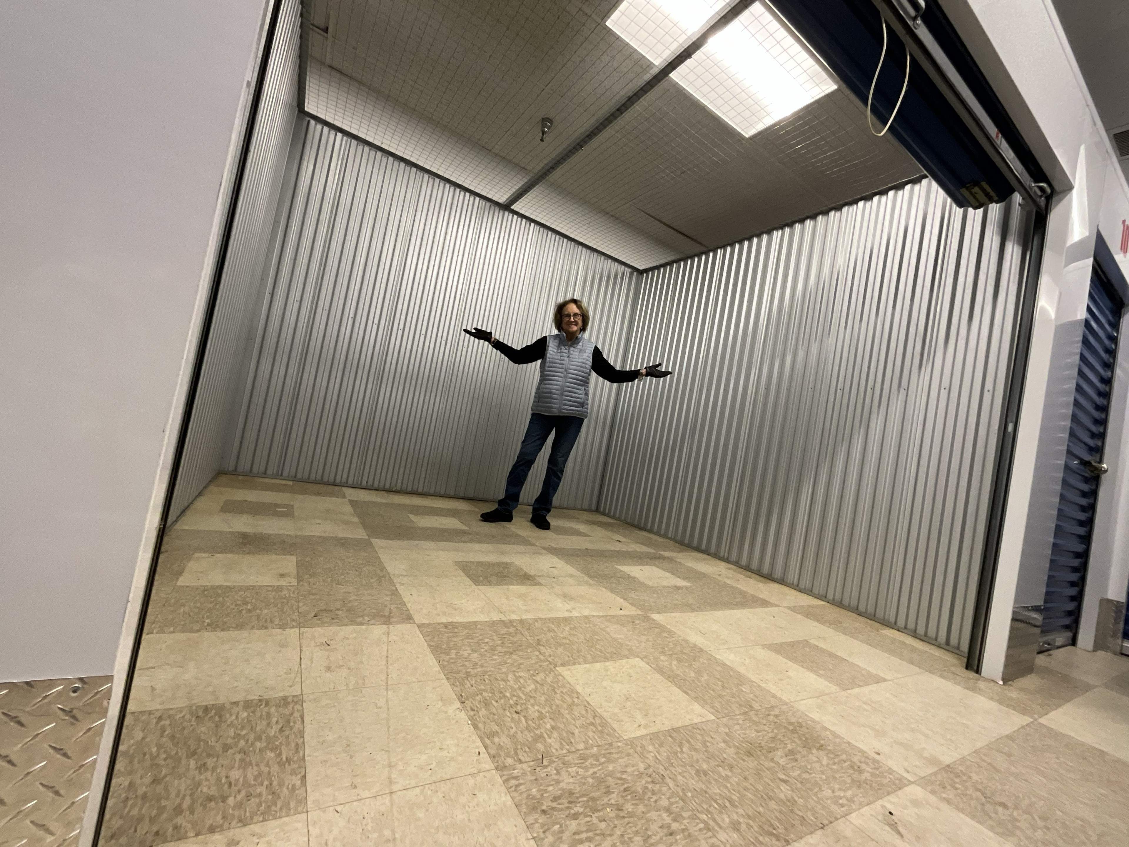 Joanne demonstrating the space inside a large storage unit