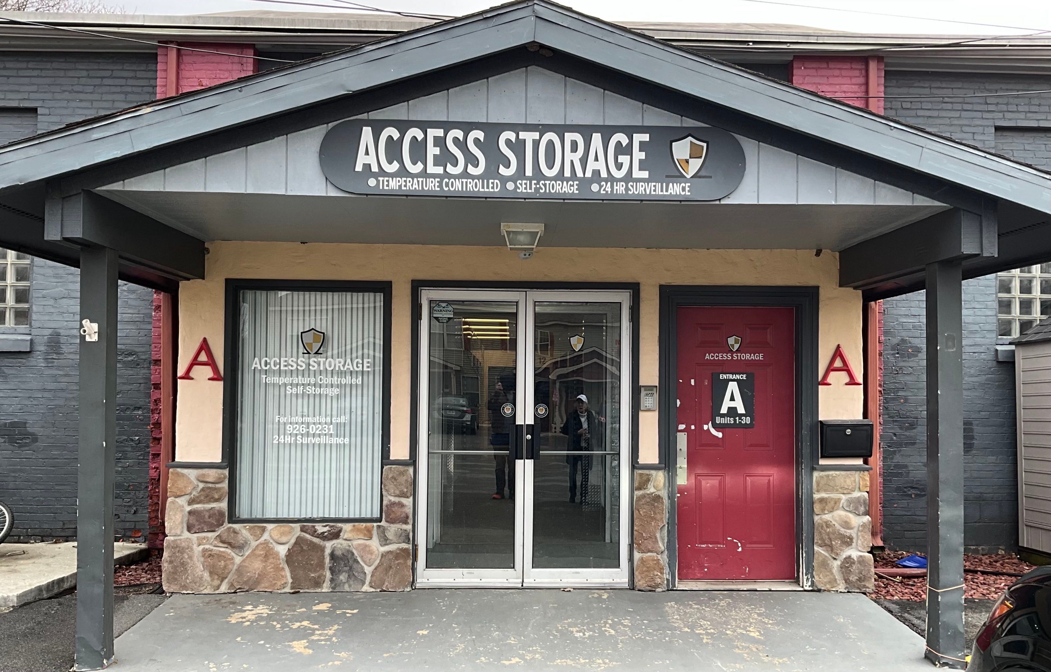 Access Storage sign and covered customer entrance at 29 1st Street in South Glens Falls